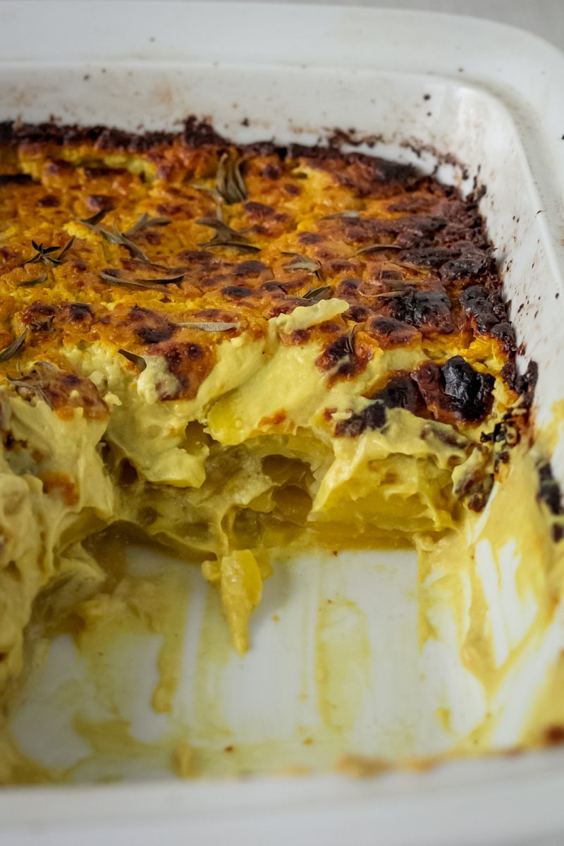 Close up of the best vegan dauphinoise potatoes, creamy but made without cream